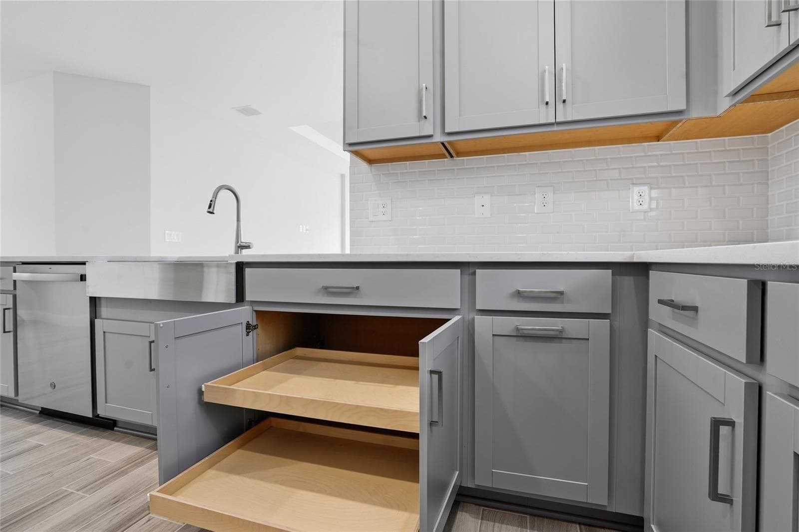 Pull-out shelf - in all lower cabinets - 4718 GAROFALO RD, WESLEY CHAPEL