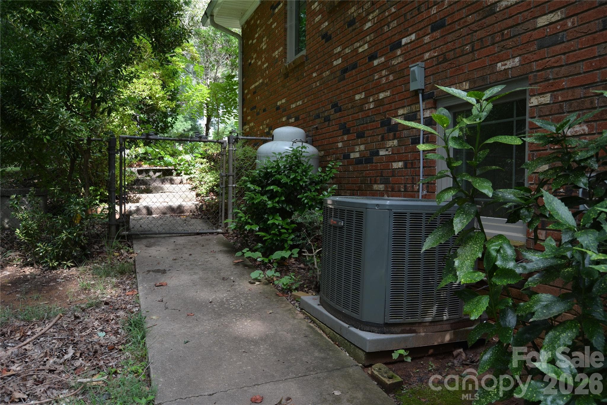 HVAC/side walkway - 467 Forest Lake Road, Forest City