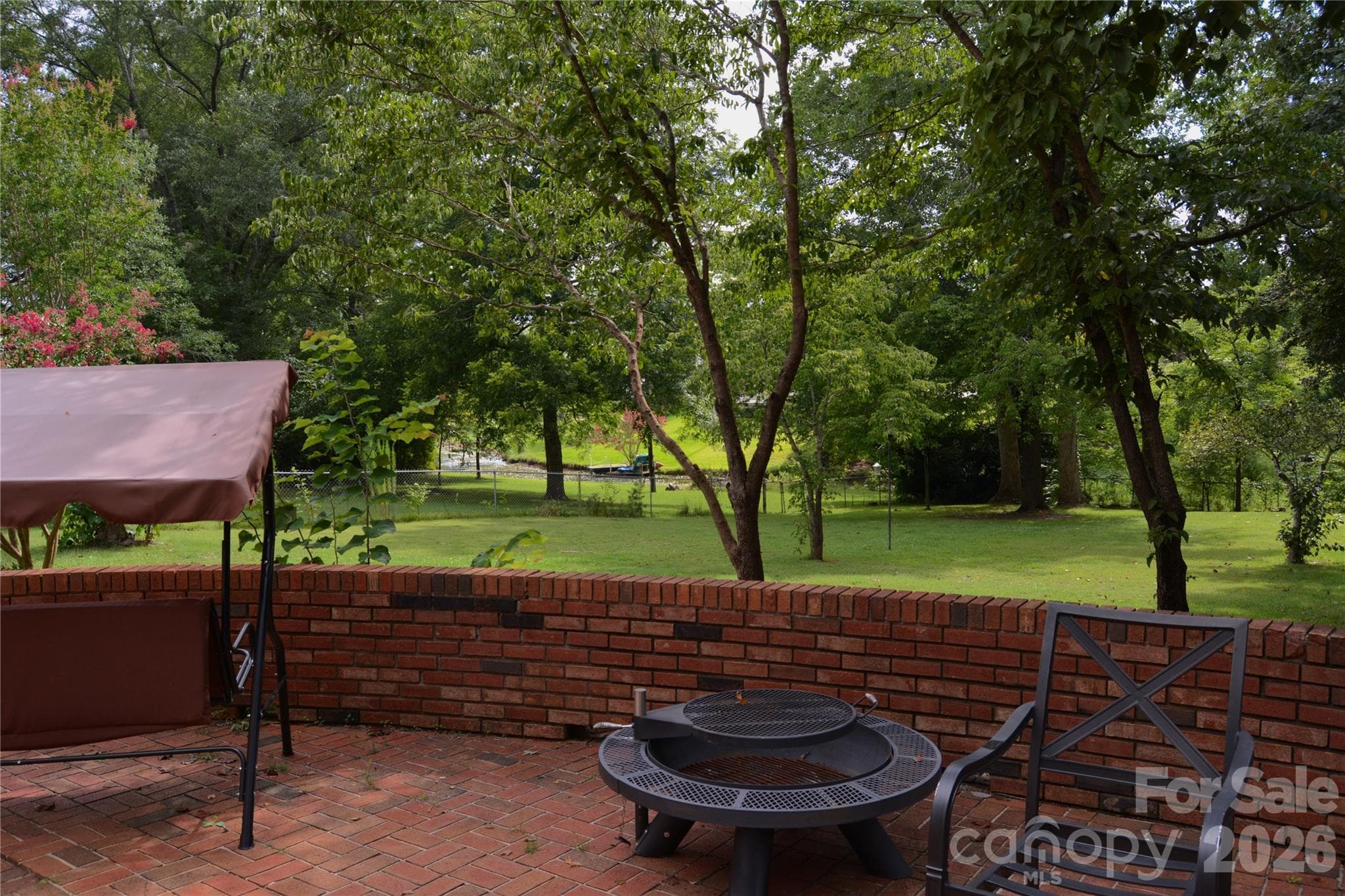 Patio view backyard - 467 Forest Lake Road, Forest City