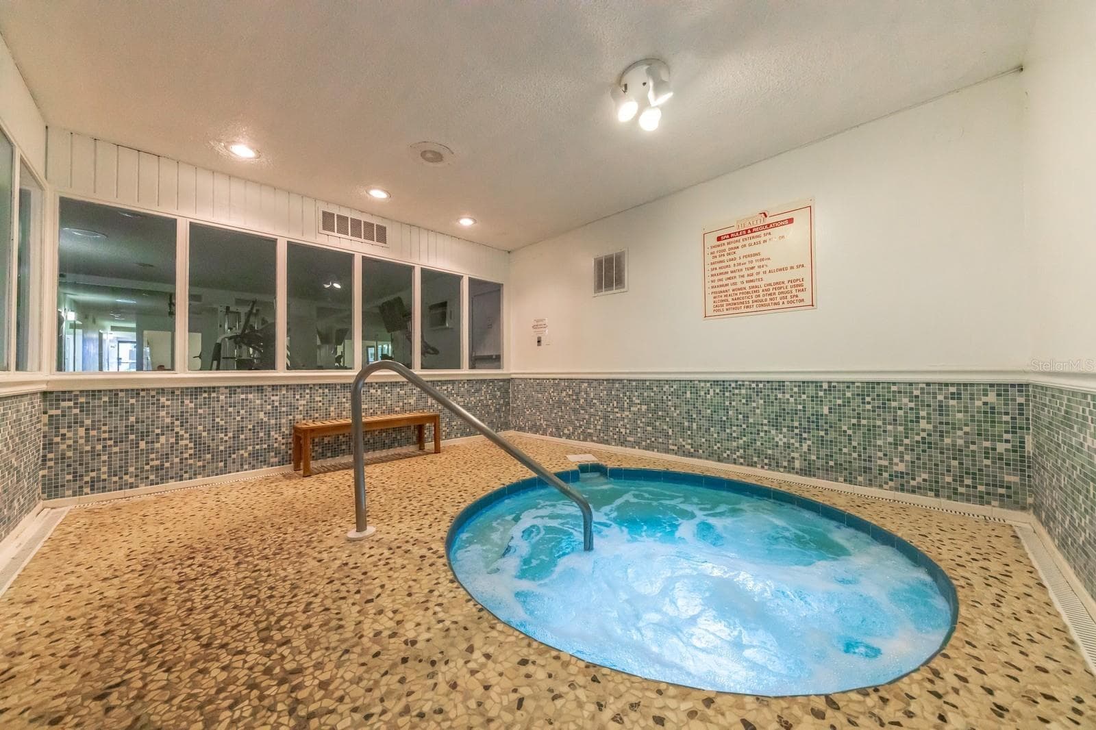 Indoor hot tub - 315 MEDALLION BLVD #H, MADEIRA BEACH