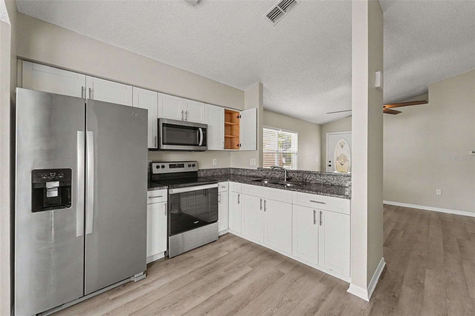 Single Family Residence at 10236 FLAGSHIP AVE, PORT RICHEY, photo 6 of 19