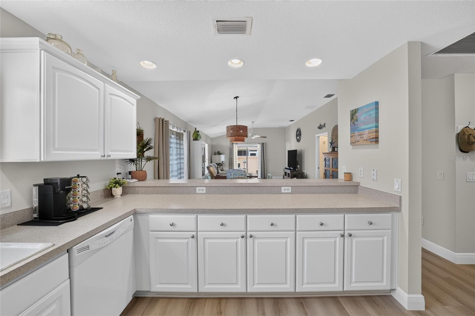 Kitchen looking into dining and living area - 308 ALMERIA ST, THE VILLAGES