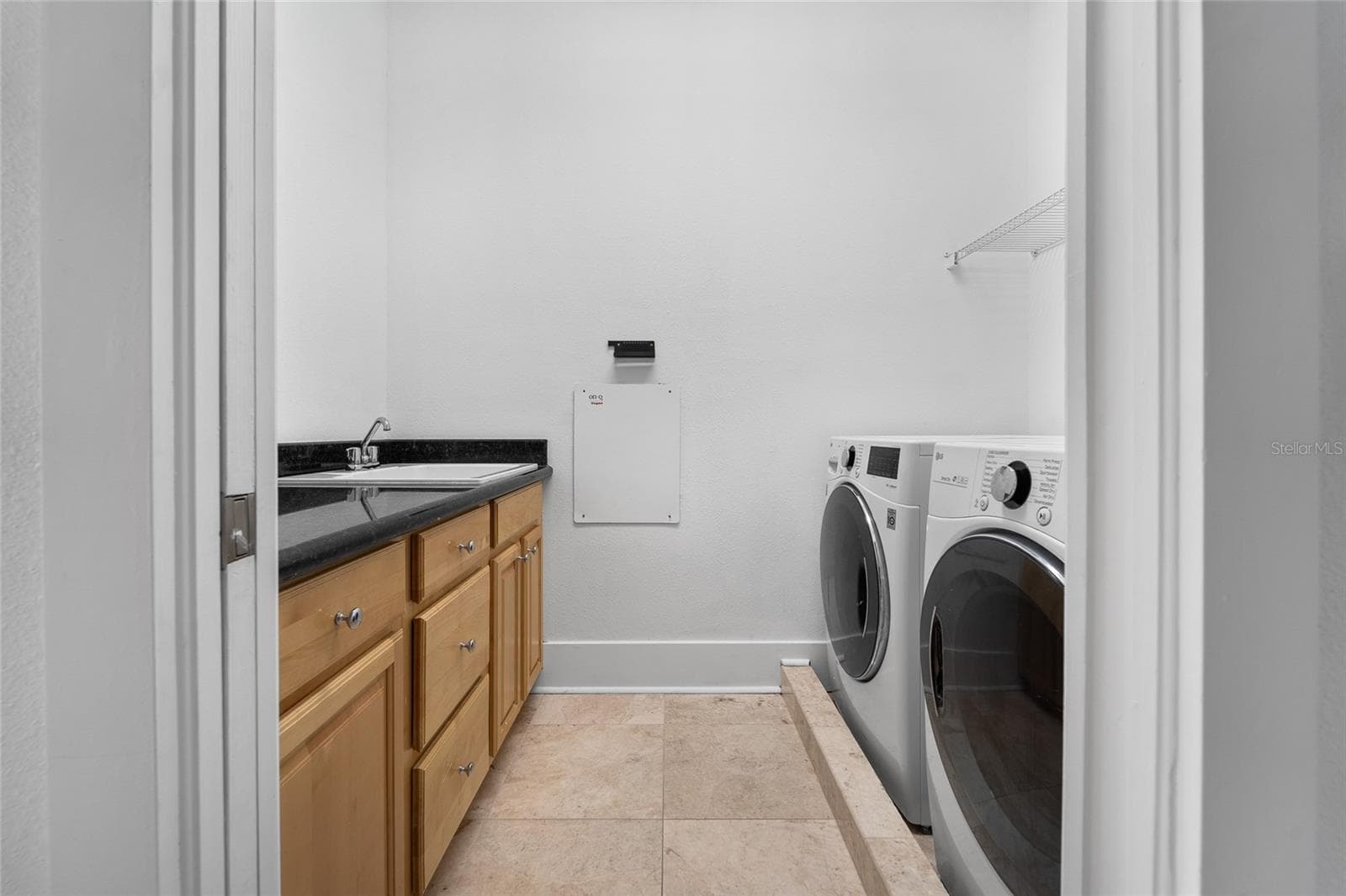 Laundry room located on the second floor - 4802 W BEACHWAY DR, TAMPA