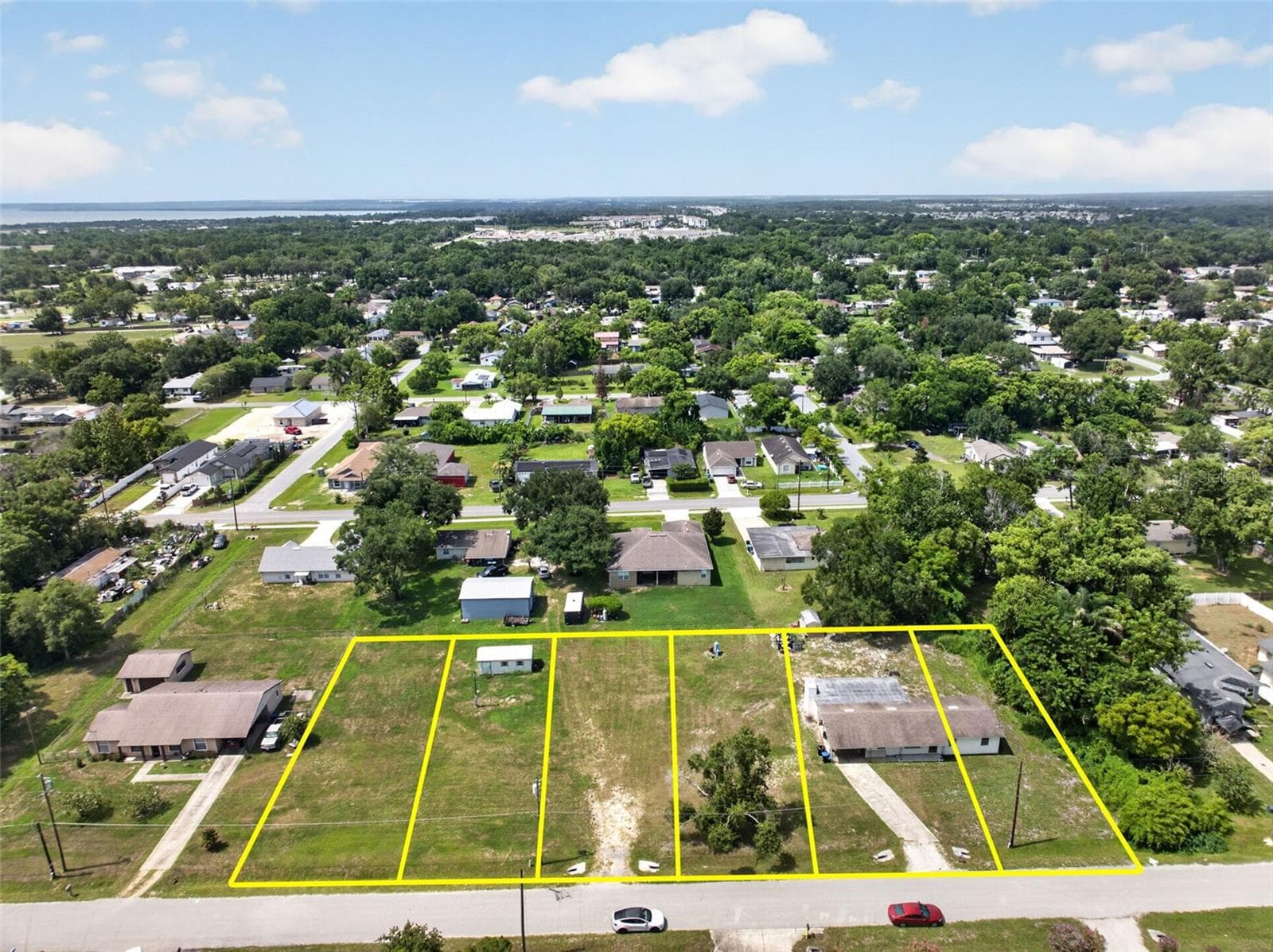 Aerial view of the parcel boundary and surrounding block. - 212 15TH AVE, OCOEE