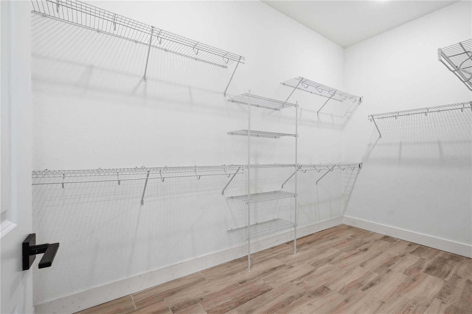 Primary closet - 8730 NW 17TH CIR, OCALA
