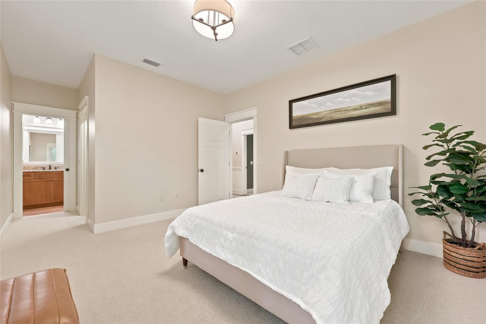 Upstairs bedroom #1 featuring en suite bathroom - 774 SW 134TH WAY, NEWBERRY