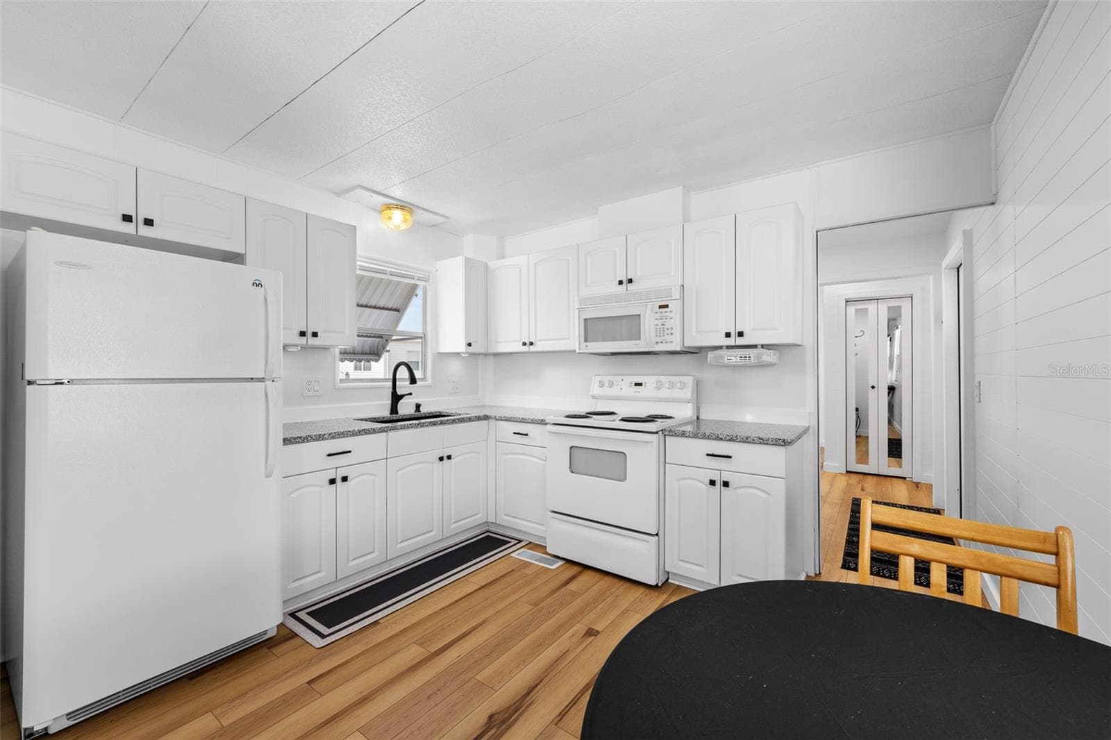 Mobile Home at 1109 45TH AVE E, ELLENTON, photo 6 of 35