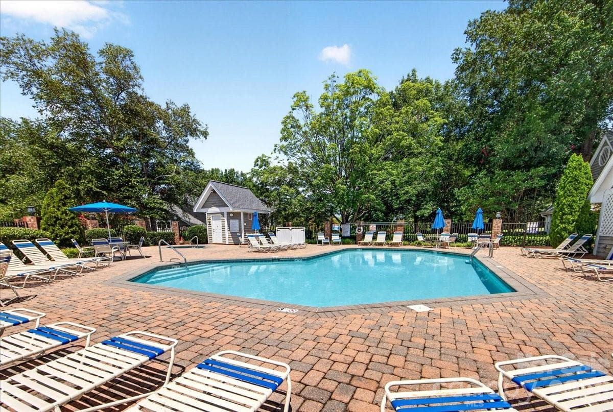 Outdoor pool, hot tub, and clubhouse - 8220 Legare Court, Charlotte