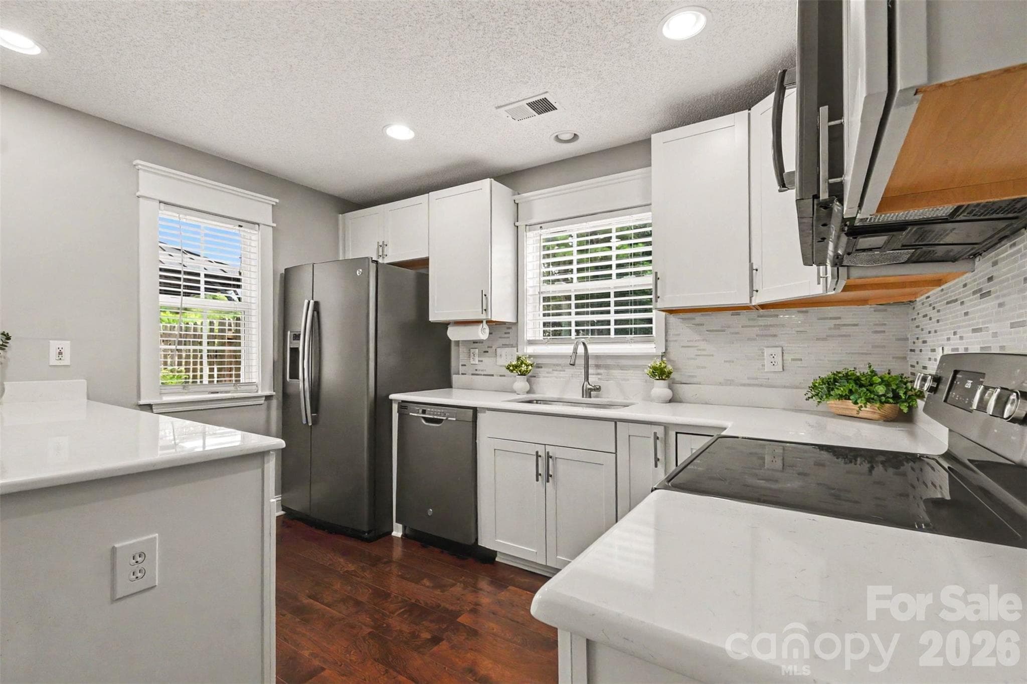 Enjoy beautiful white quartz counters - 12683 Bluestem Lane, Charlotte