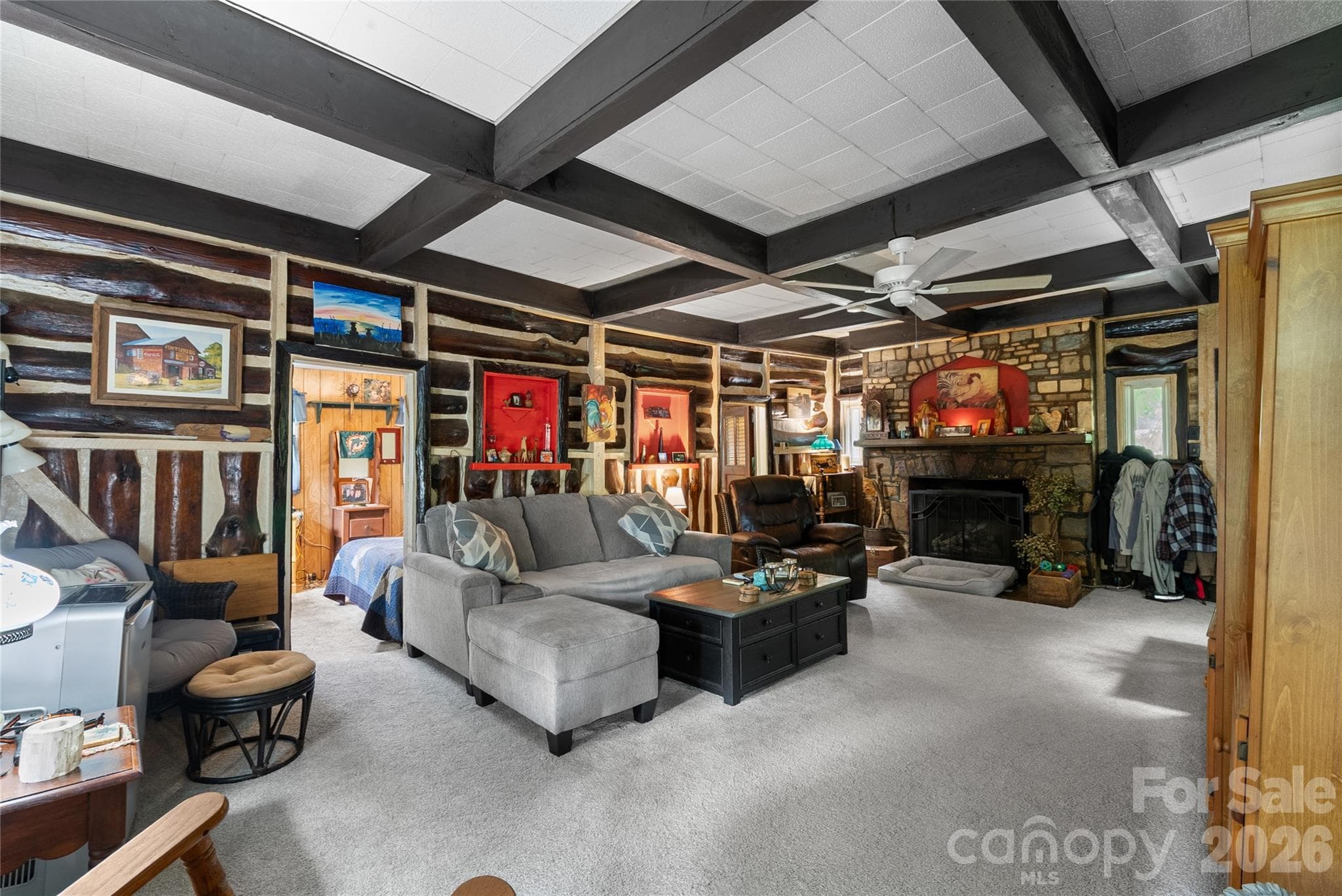 Living room w/log cabin walls - 3151 N Bearwallow Road, Hendersonville