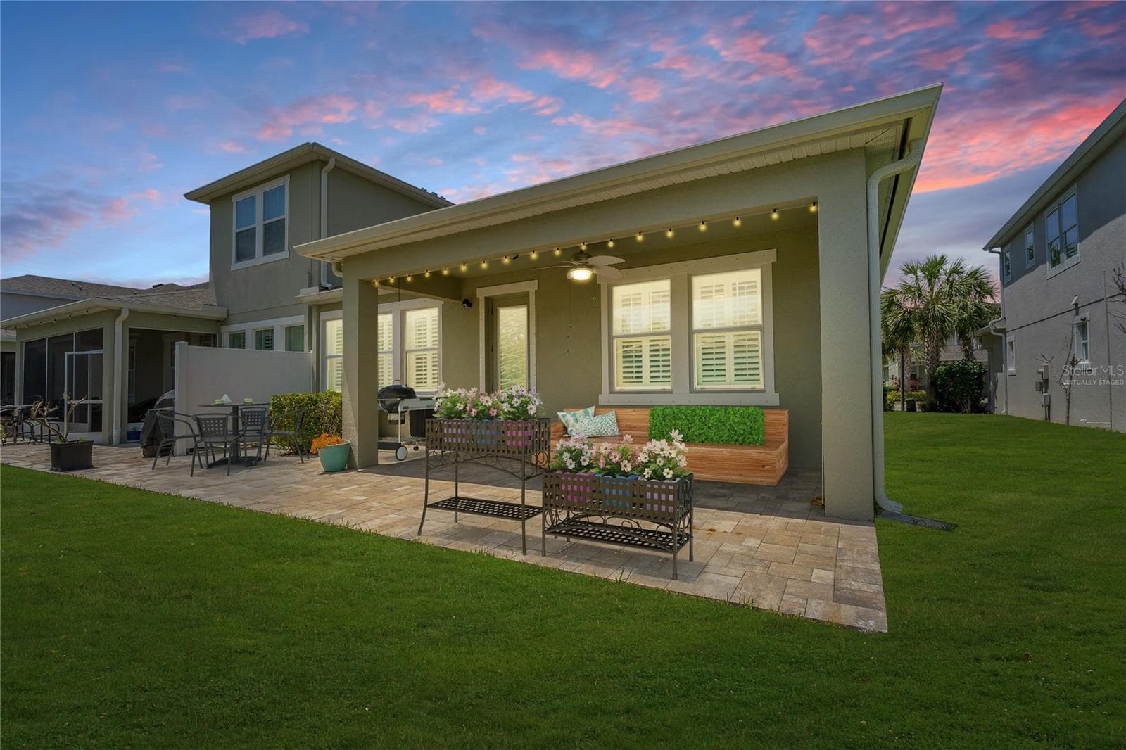 Virtually Staged - Covered Lanai with Brick Pavers! - 597 OZONA VILLAGE DR, PALM HARBOR
