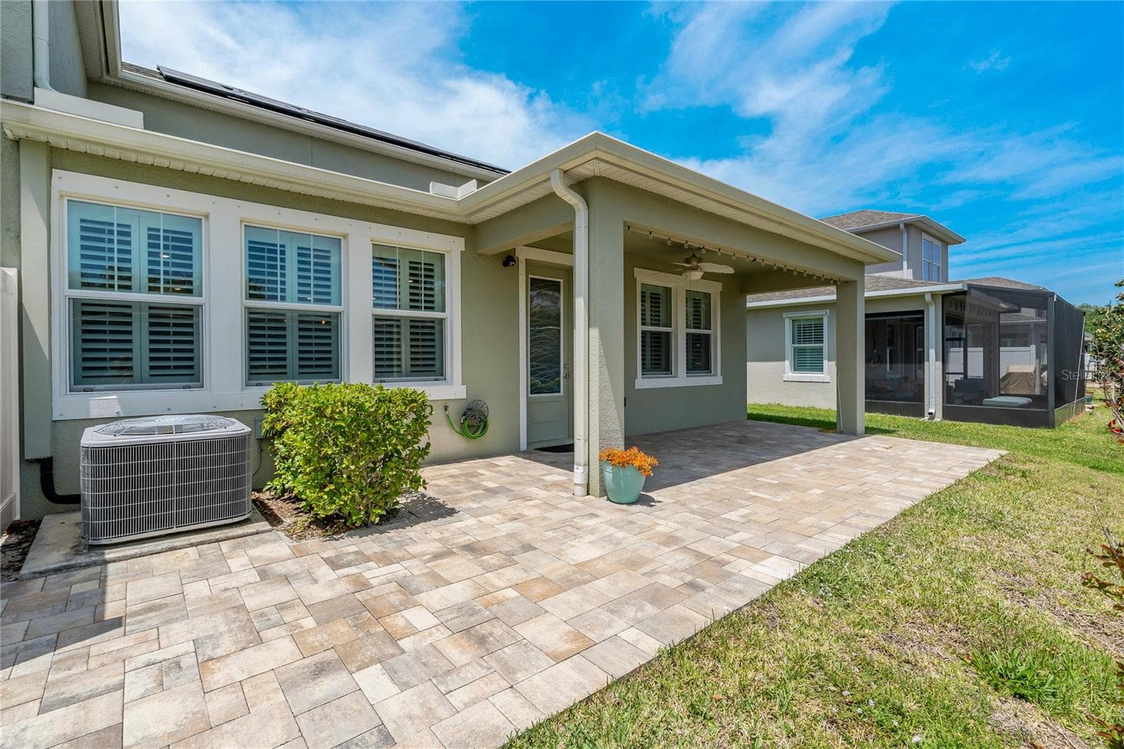 Uncovered Space - Great for your BBQ Grill! - 597 OZONA VILLAGE DR, PALM HARBOR