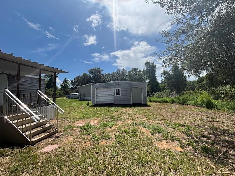 Manufactured Home at 15299 NE 238TH ST, FORT MC COY, photo 3 of 31