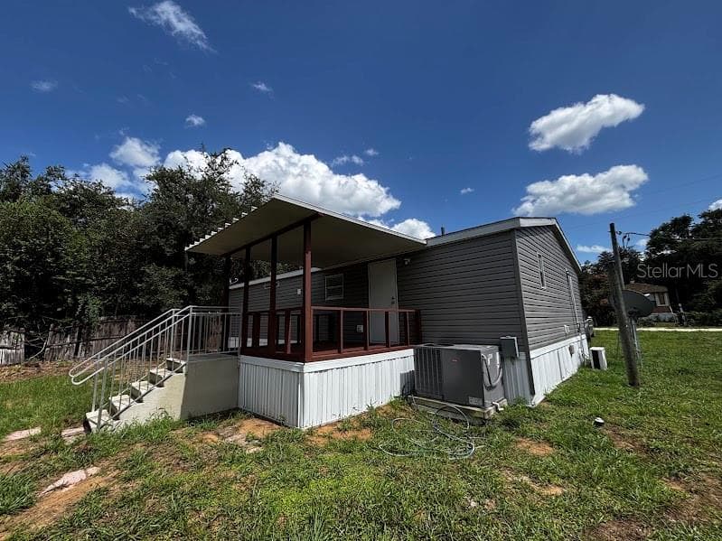 Manufactured Home at 15299 NE 238TH ST, FORT MC COY, photo 4 of 31