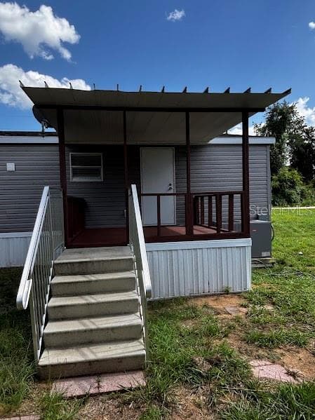 Manufactured Home at 15299 NE 238TH ST, FORT MC COY, photo 5 of 31