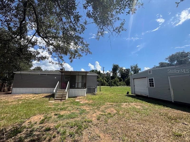 Manufactured Home at 15299 NE 238TH ST, FORT MC COY, photo 6 of 31