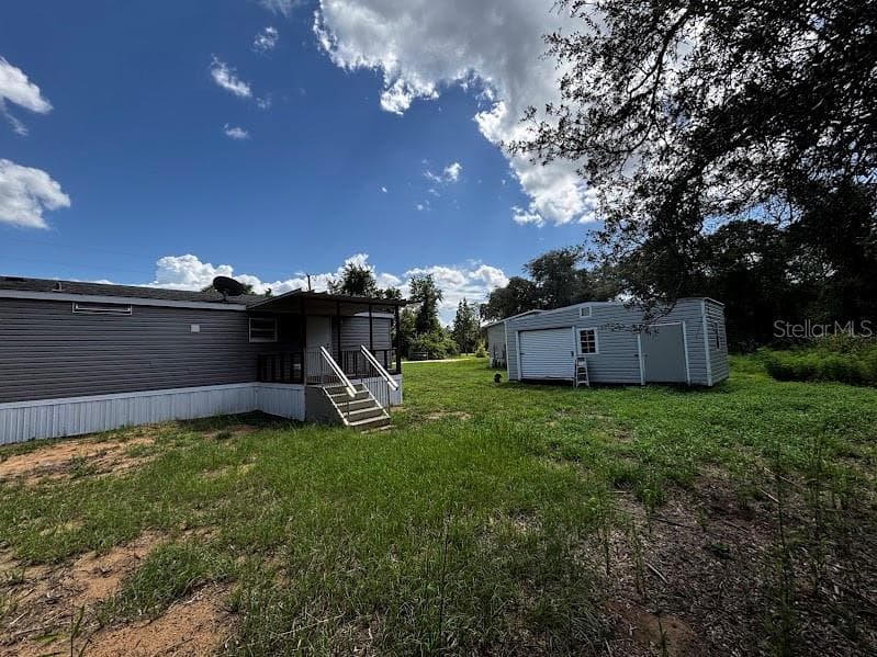 Manufactured Home at 15299 NE 238TH ST, FORT MC COY, photo 7 of 31