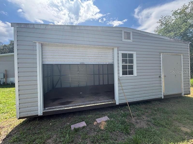 Manufactured Home at 15299 NE 238TH ST, FORT MC COY, photo 8 of 31