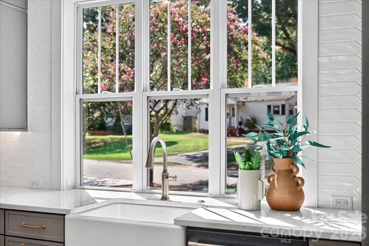 Apron kitchen sink with window view - 3940 Admiral Avenue, Charlotte