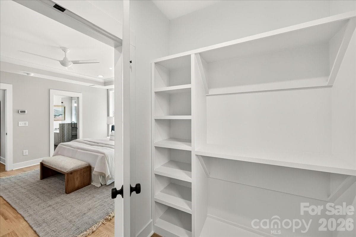 Primary closet with built-in shelving - 3940 Admiral Avenue, Charlotte
