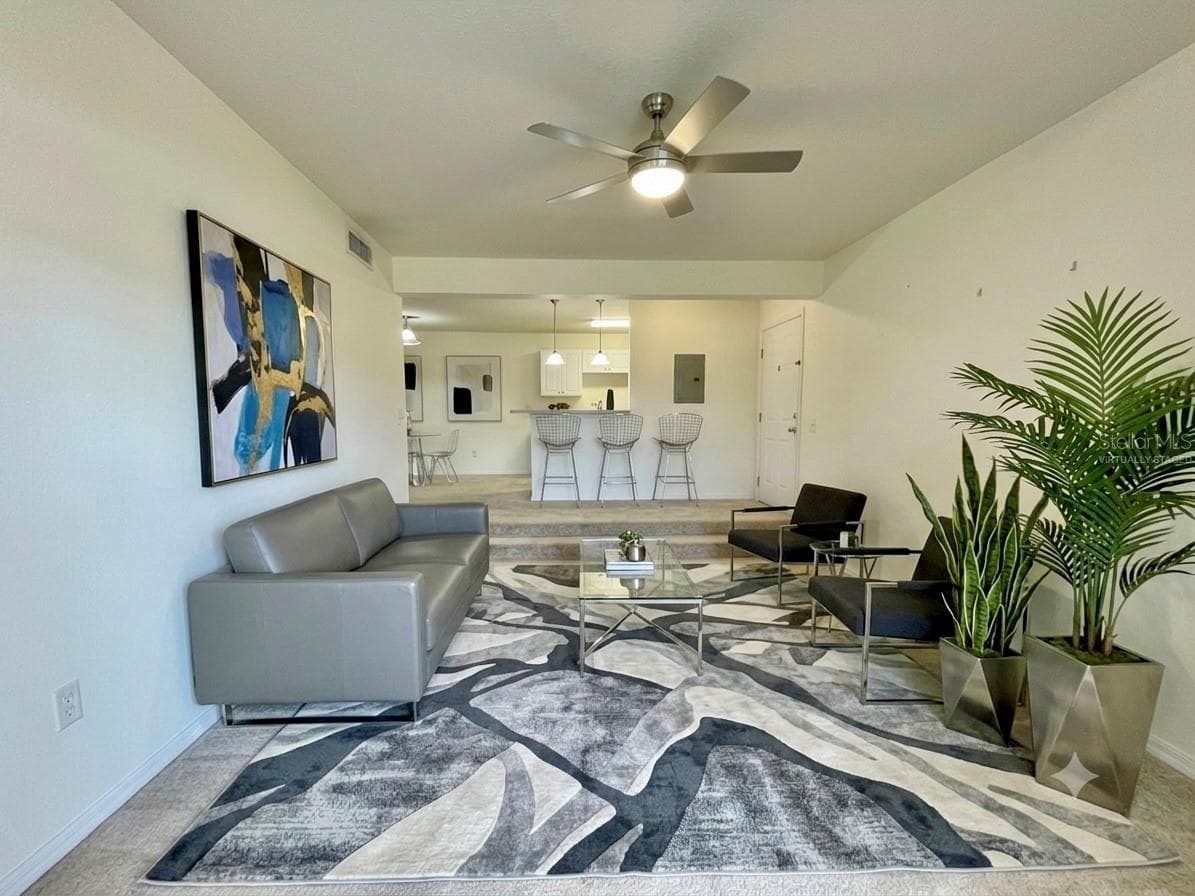 virtually staged living room - 145 N PEARL LAKE CSWY #112, ALTAMONTE SPRINGS