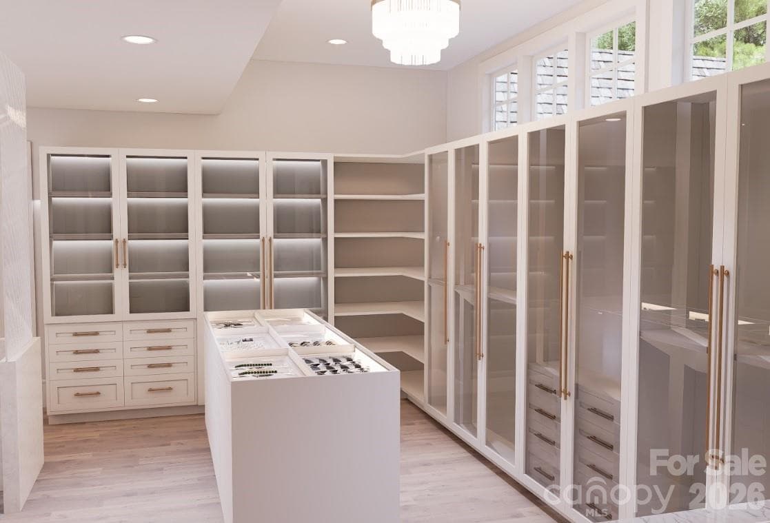His side of closet - 104 Sherwood Drive, Huntersville
