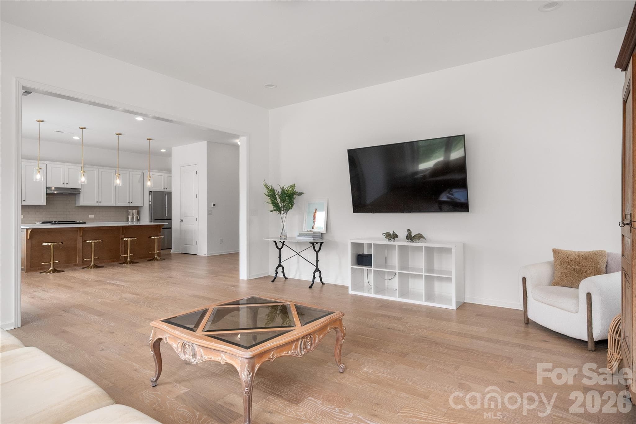 Great room into kitchen - 1042 Scotch Meadows Loop, Monroe