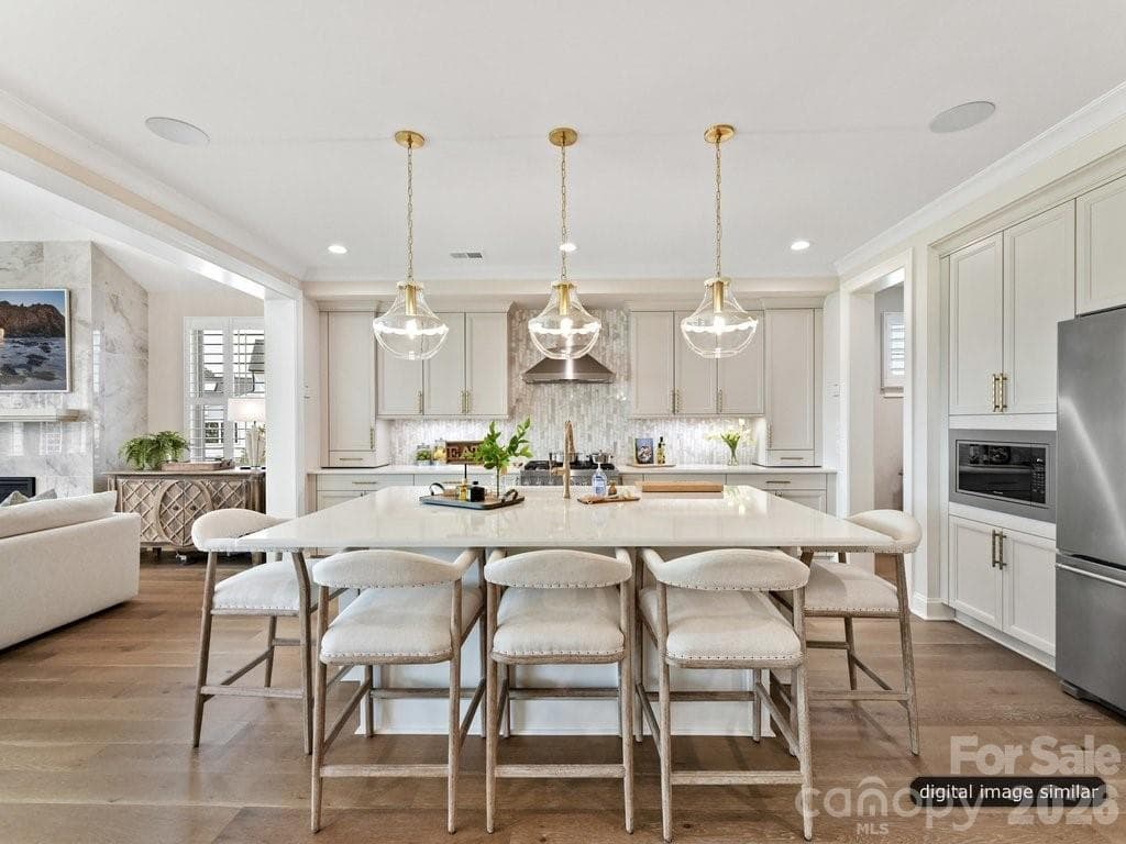 Gorgeous Kitchen with an expanded kitchen island with 5 seats - 6535 Cashion Road, Huntersville