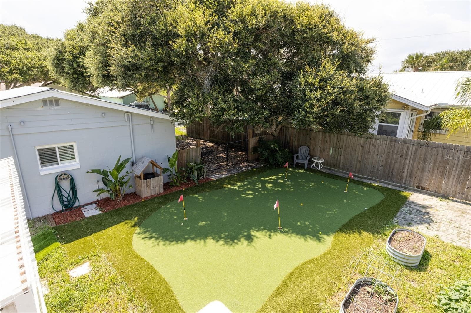 View from the back porch overlooking the backyard - 904 S DAYTONA AVE, FLAGLER BEACH