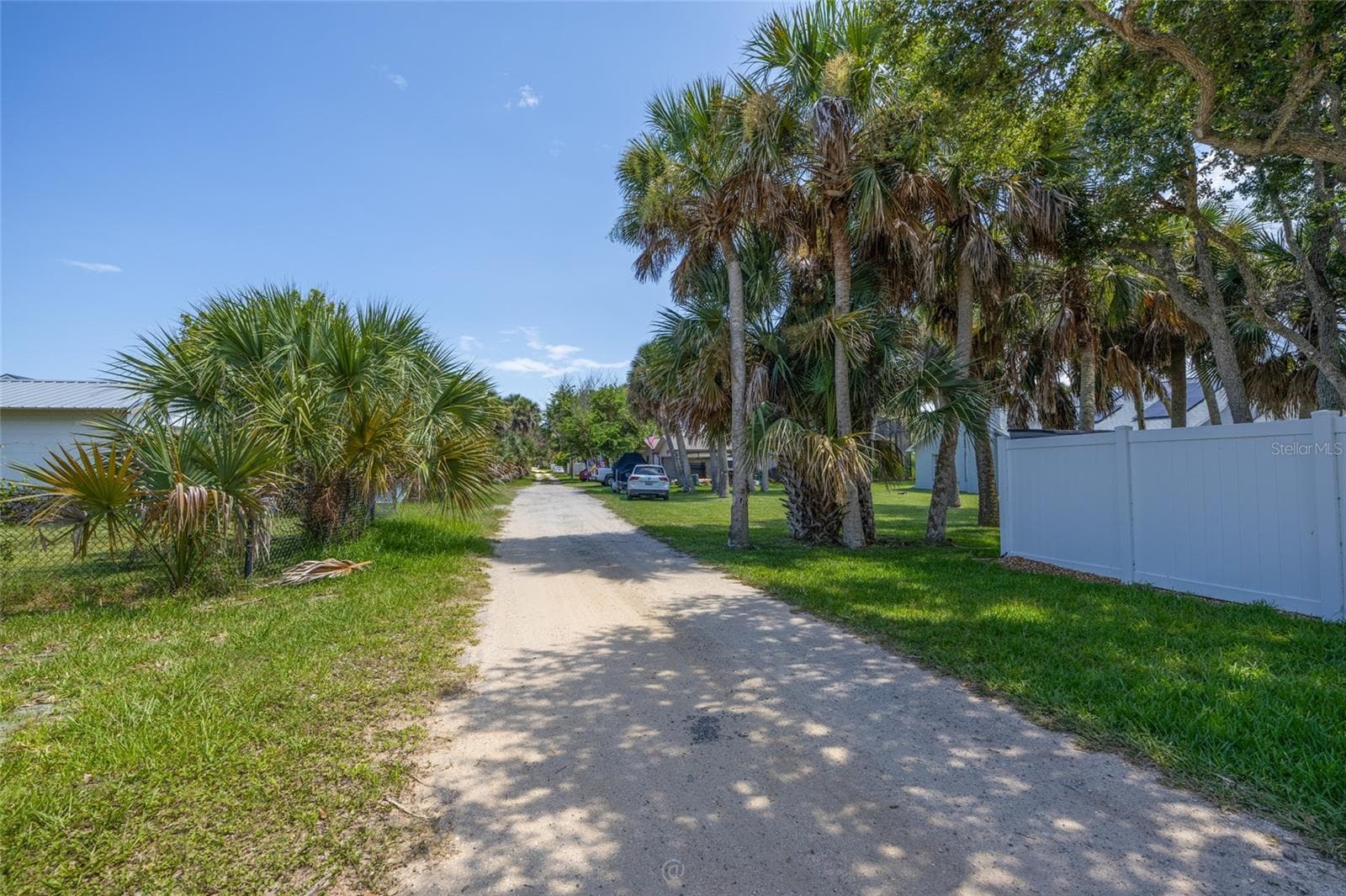 View of alley road behind house facing South - 904 S DAYTONA AVE, FLAGLER BEACH
