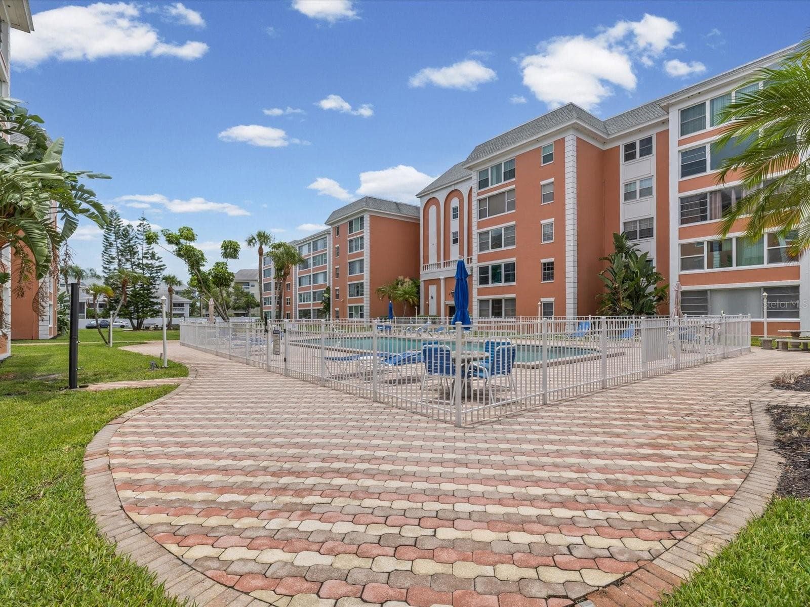 VIEW OF THE POOL, CLUBHOUSE ON YOUR RIGHT - 6800 20TH AVE N #503, ST PETERSBURG