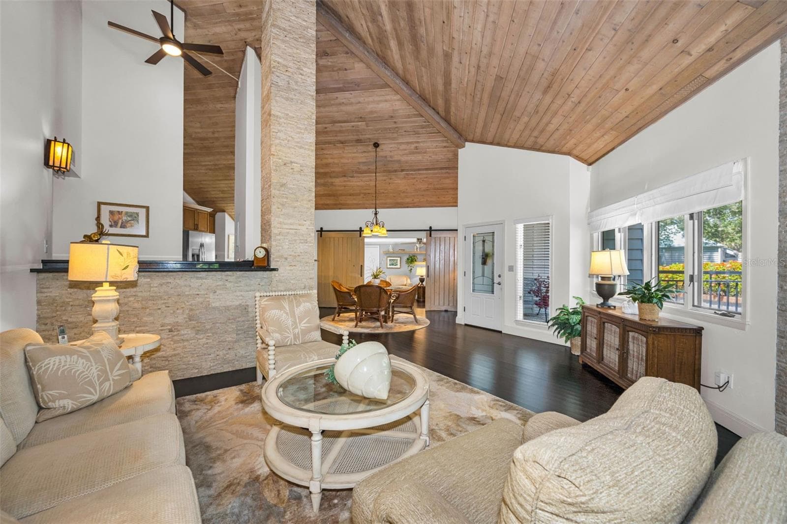 Livingroom looking into the formal dining and den. - 10497 LONGWOOD DR, SEMINOLE