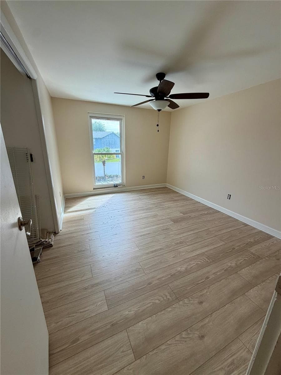 Bedroom 2 - new paint & LVP floors - 15705 CASHMERE LN, TAMPA