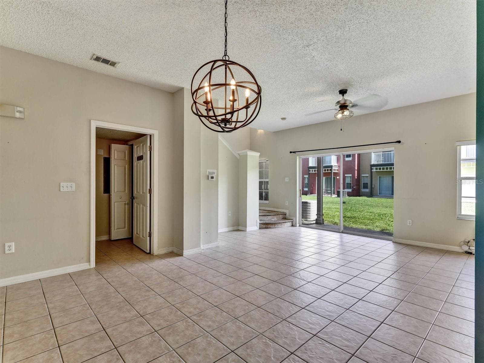 Living + Dining - 8407 BLUE LAGOON DR, KISSIMMEE