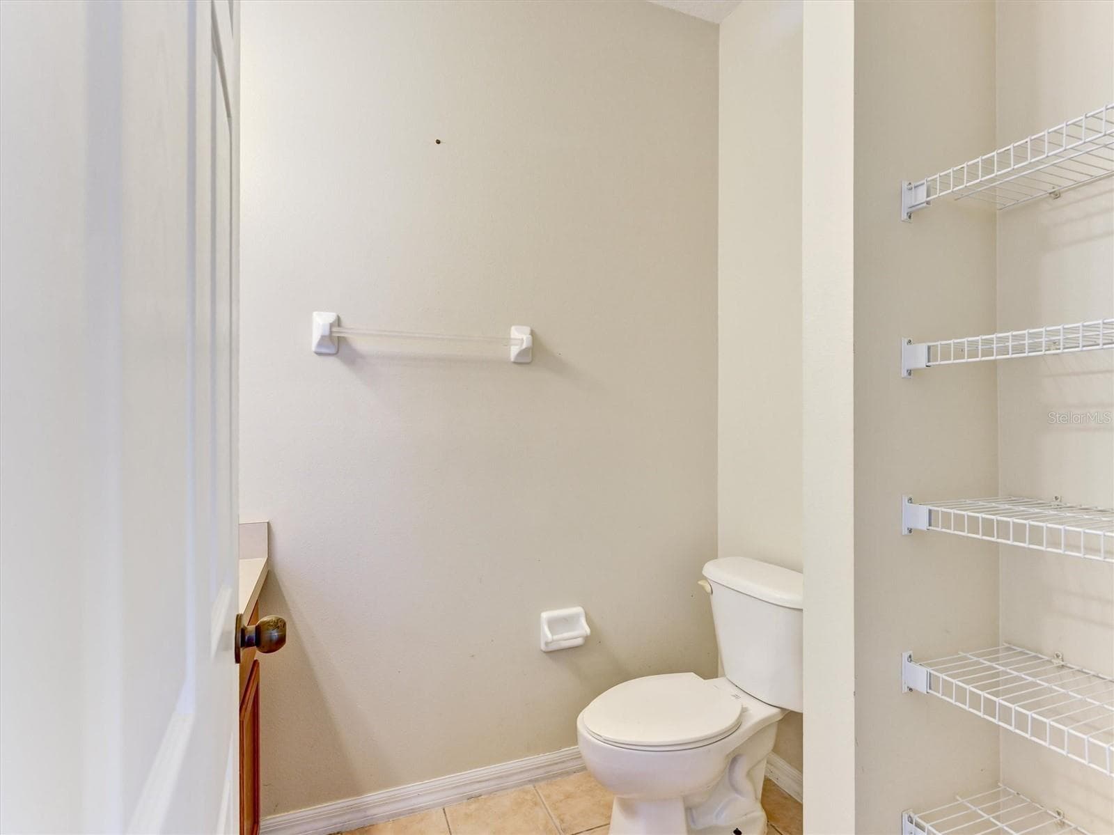 Half Bath Downstairs - 8407 BLUE LAGOON DR, KISSIMMEE