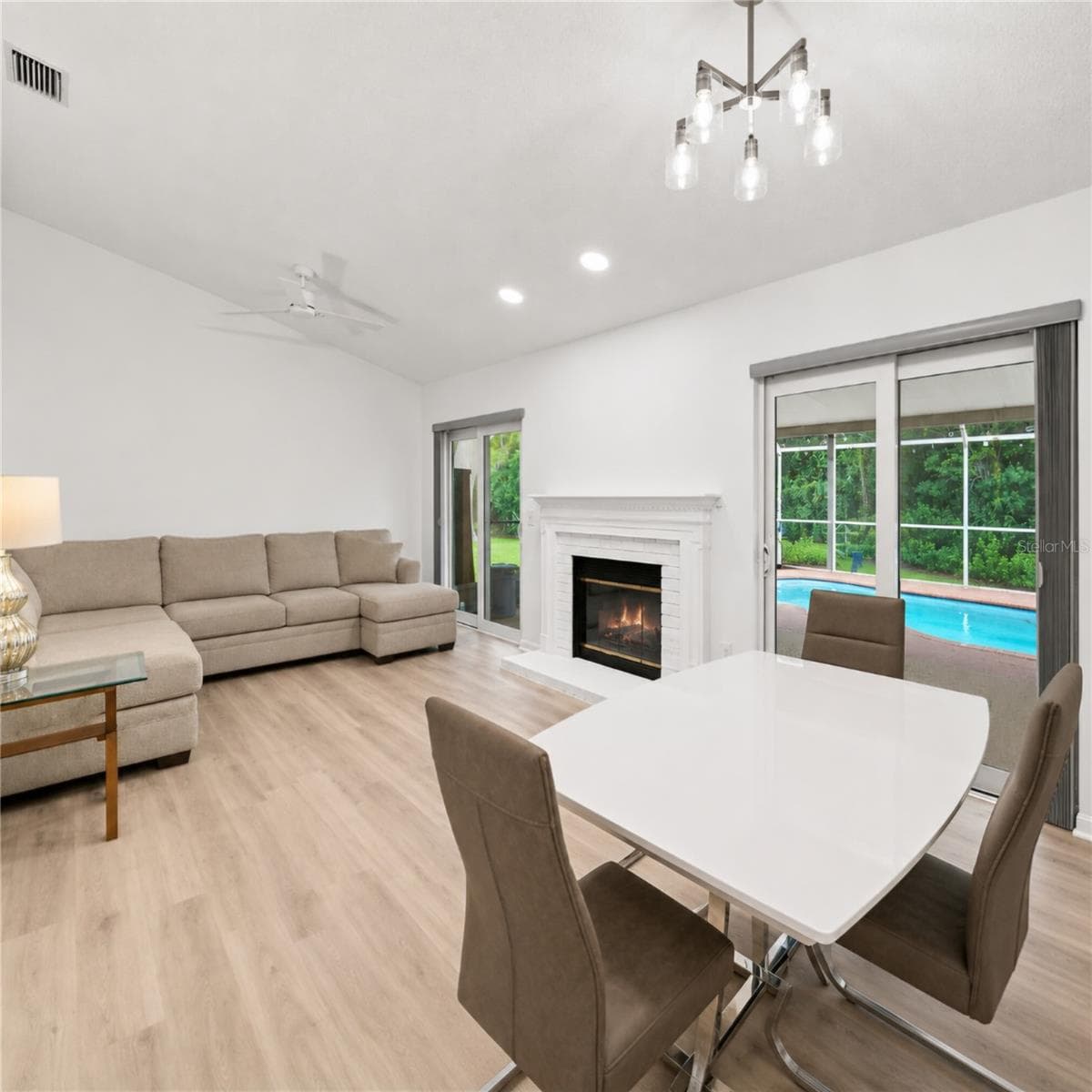 Fireplace rendered White to show a different look. - 1014 HARDWOOD DR, VALRICO