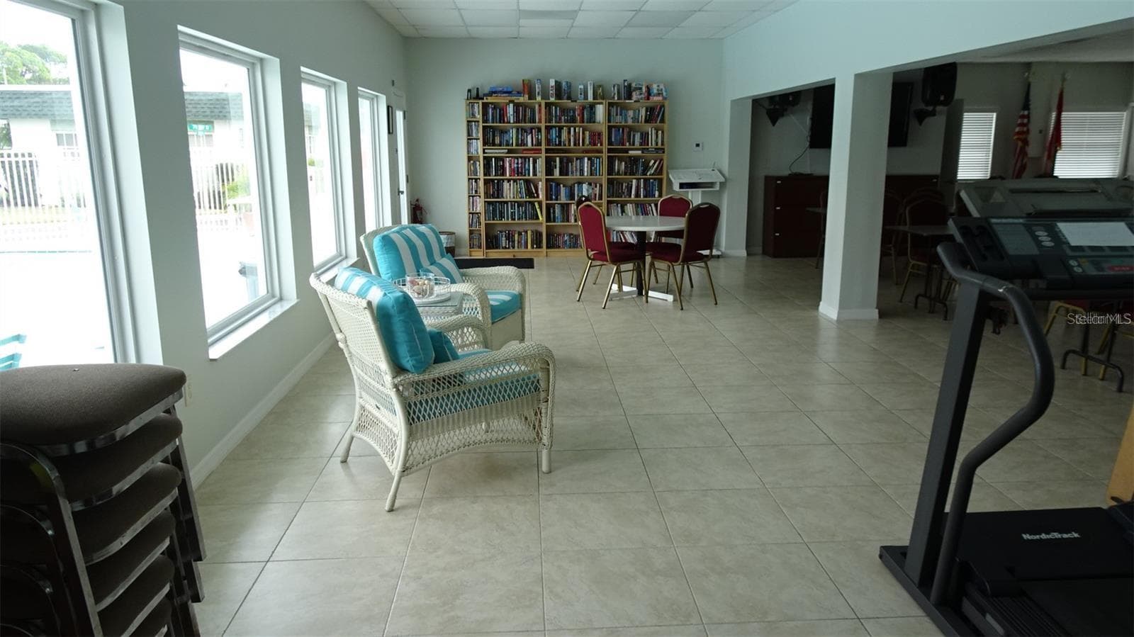 Clubhouse offers some gym equipment and small library to share books. - 7868 40TH AVE N #7868, ST PETERSBURG
