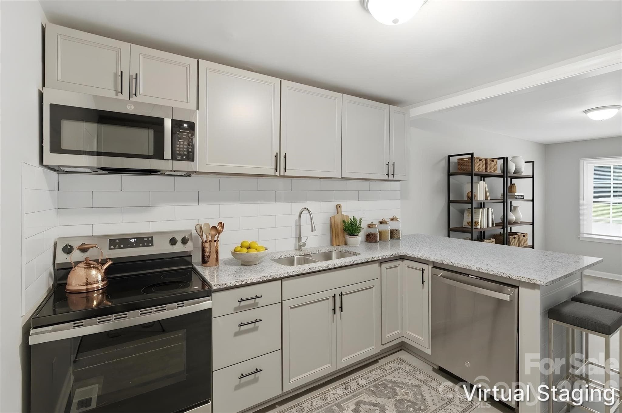 Your new kitchen!! Upgrades include granite counters, SS appliances (includes dishwasher, electric range & microwave), shaker-style cabinets, subway tile backsplash & SS dual deep sink (virtually staged & enhanced). - Charlotte