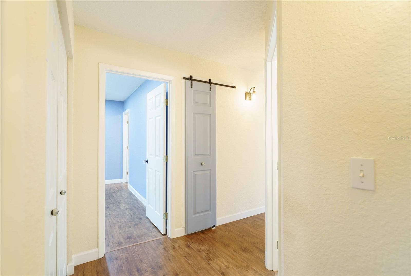 Barn door on linen closet - 4418 NE 4TH ST, OCALA