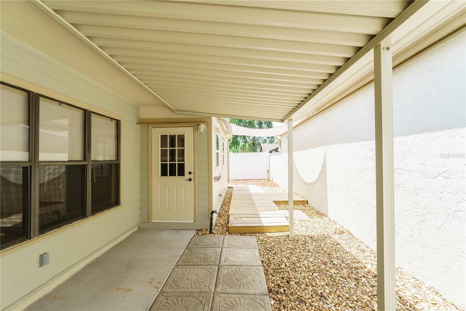 Covered patio--enjoy your morning coffee - 4418 NE 4TH ST, OCALA