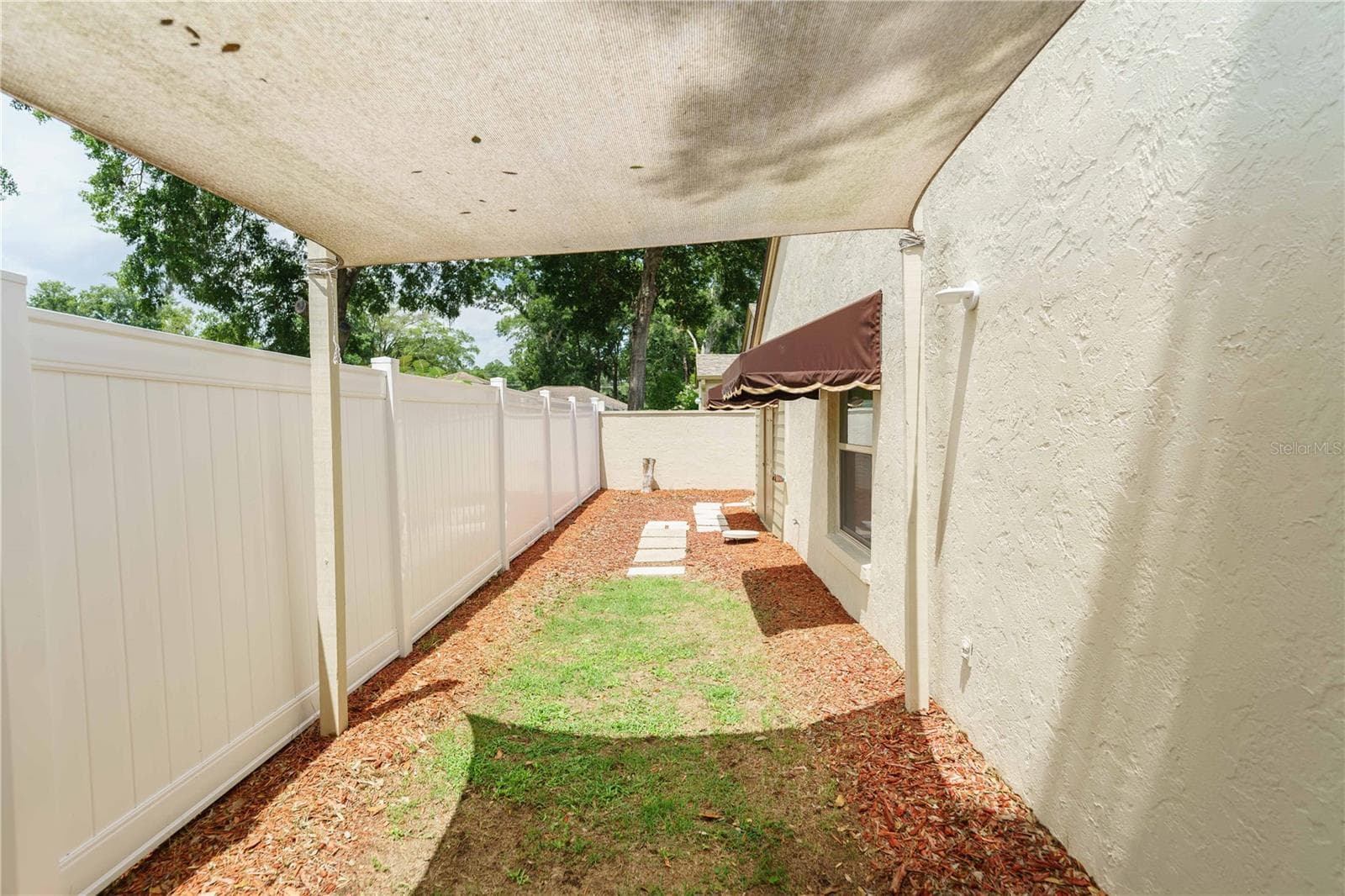 Backyard--covered areas - 4418 NE 4TH ST, OCALA