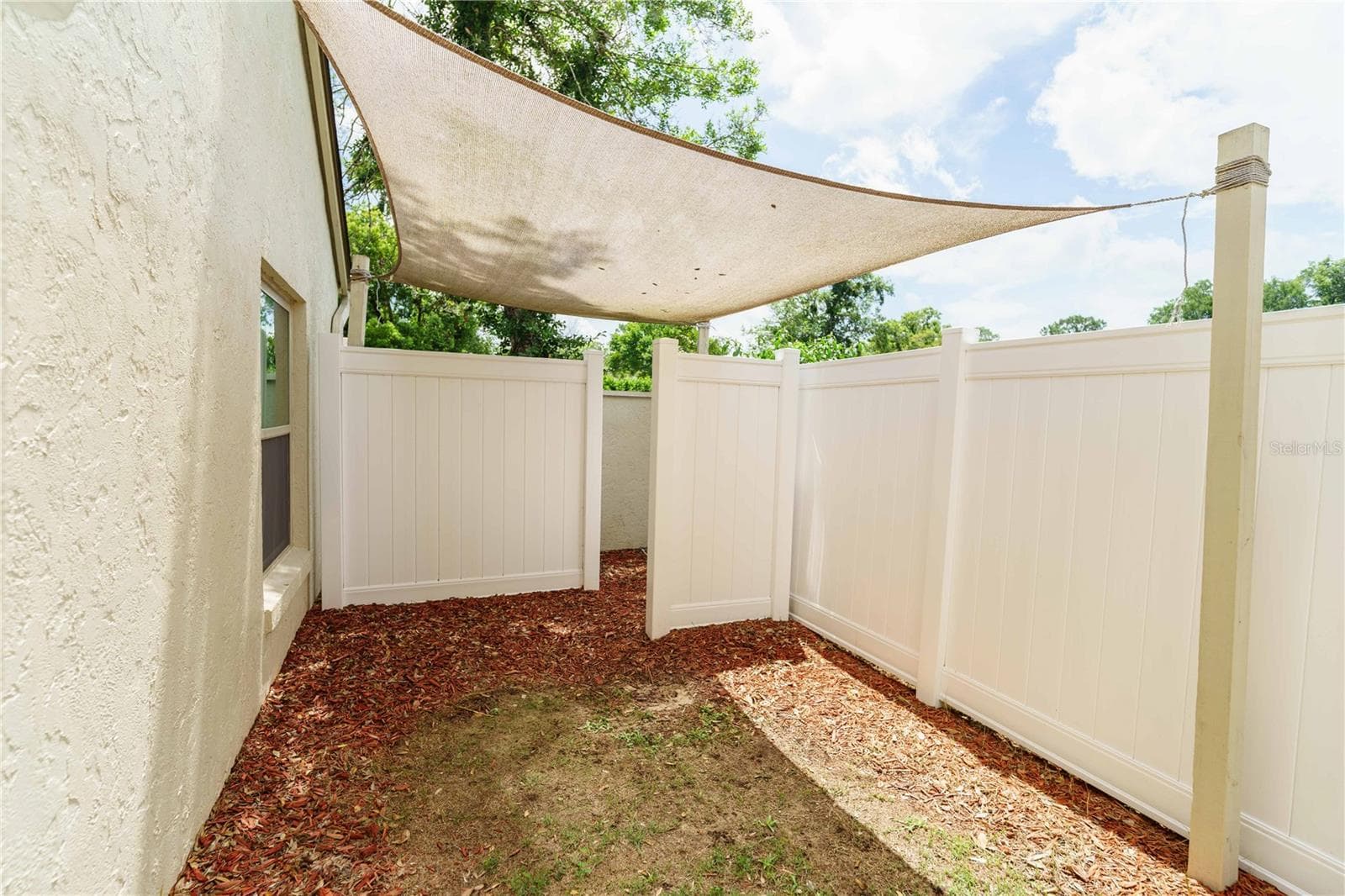 Backyard--Vinyl fence for privacy - 4418 NE 4TH ST, OCALA