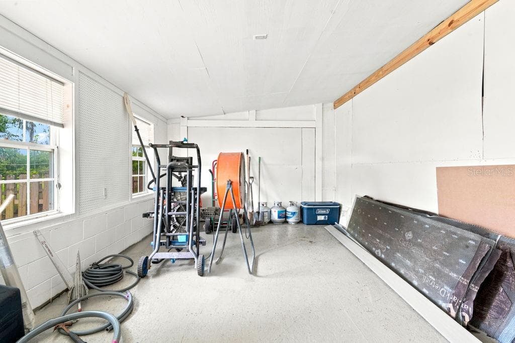 Attached Storage Room-side of house - 220 BRANDY CT, DELTONA