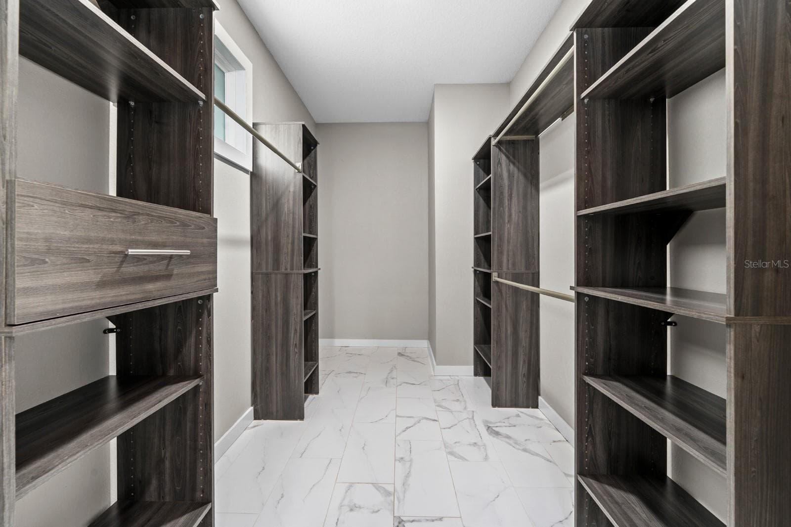 Custom walk in closet designed for exceptional storage - 1028 5TH ST N, ST PETERSBURG