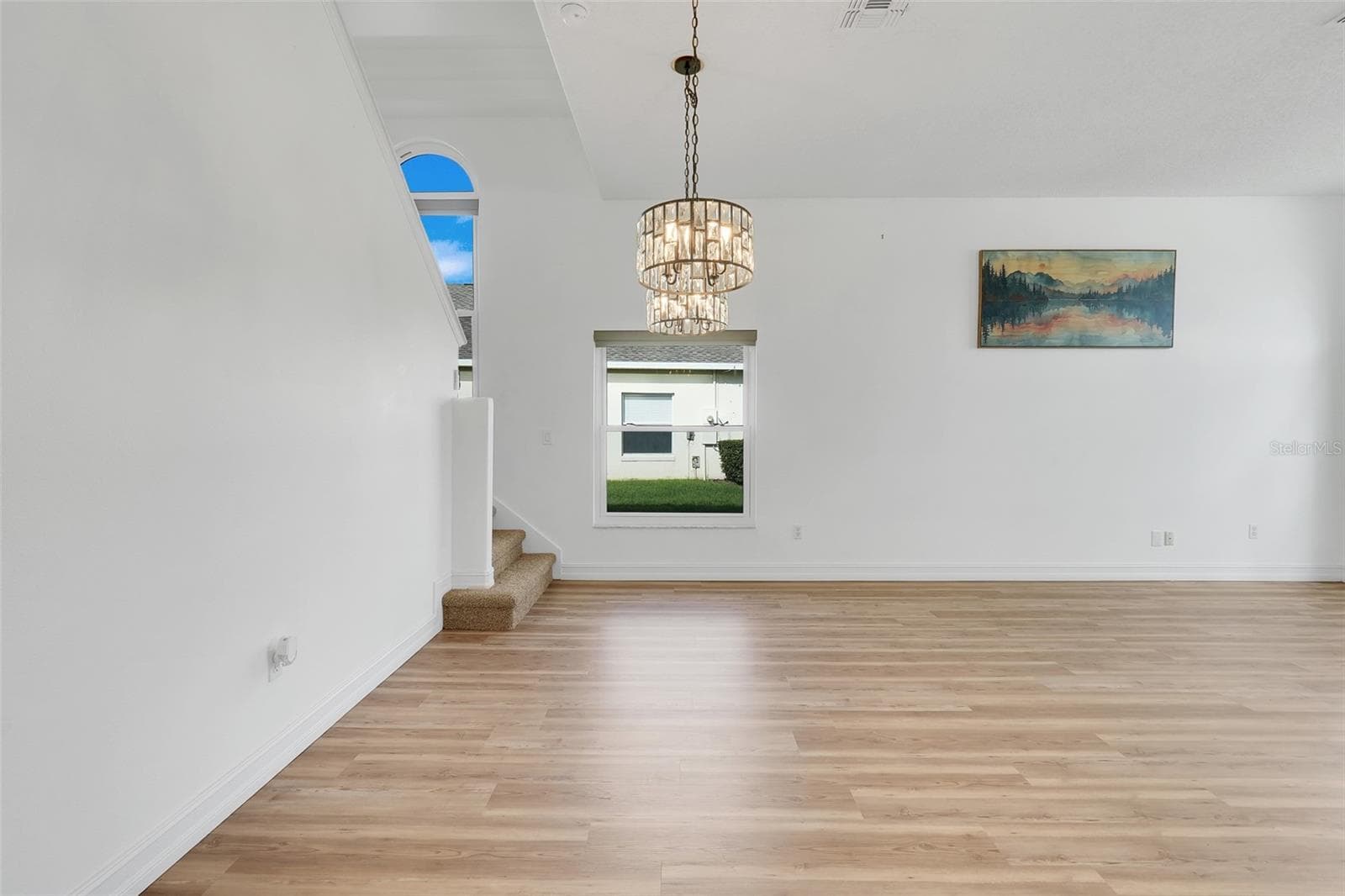 Dining Room with chandeliers - 16740 GLENBROOK BLVD, CLERMONT