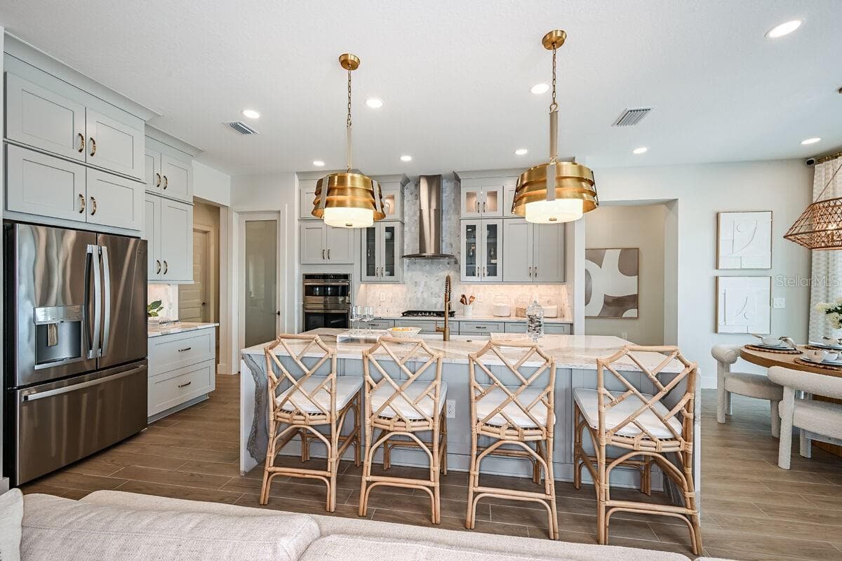 Kitchen-Photo description represents the model home of same floor plan. - 17524 MACARTHUR LOOP, VENICE
