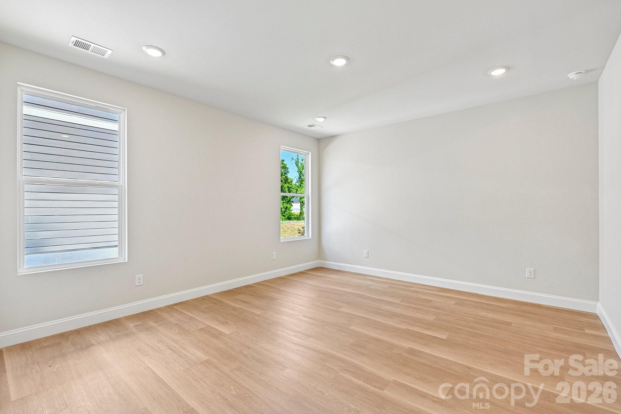 Primary bedroom on main/upper level - 605 Banter Lane, Gastonia