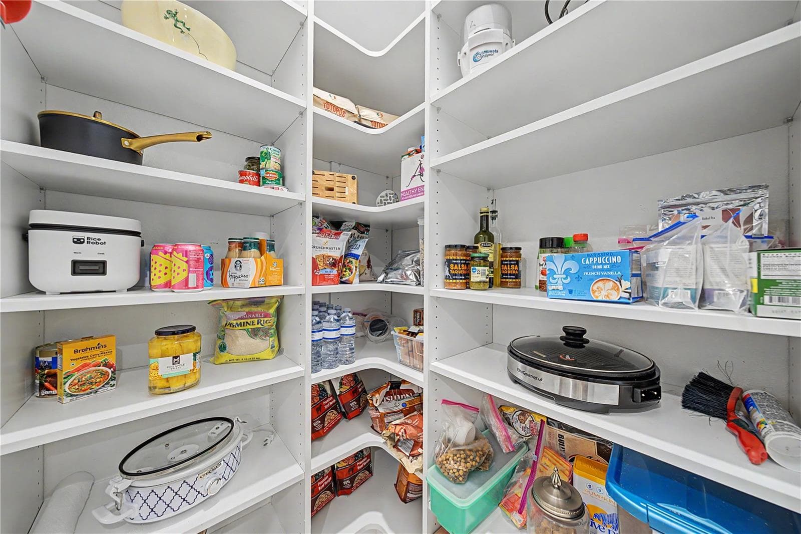 Wooden shleves in closet pantry - 4926 SOUTHERN VALLEY LOOP, BROOKSVILLE