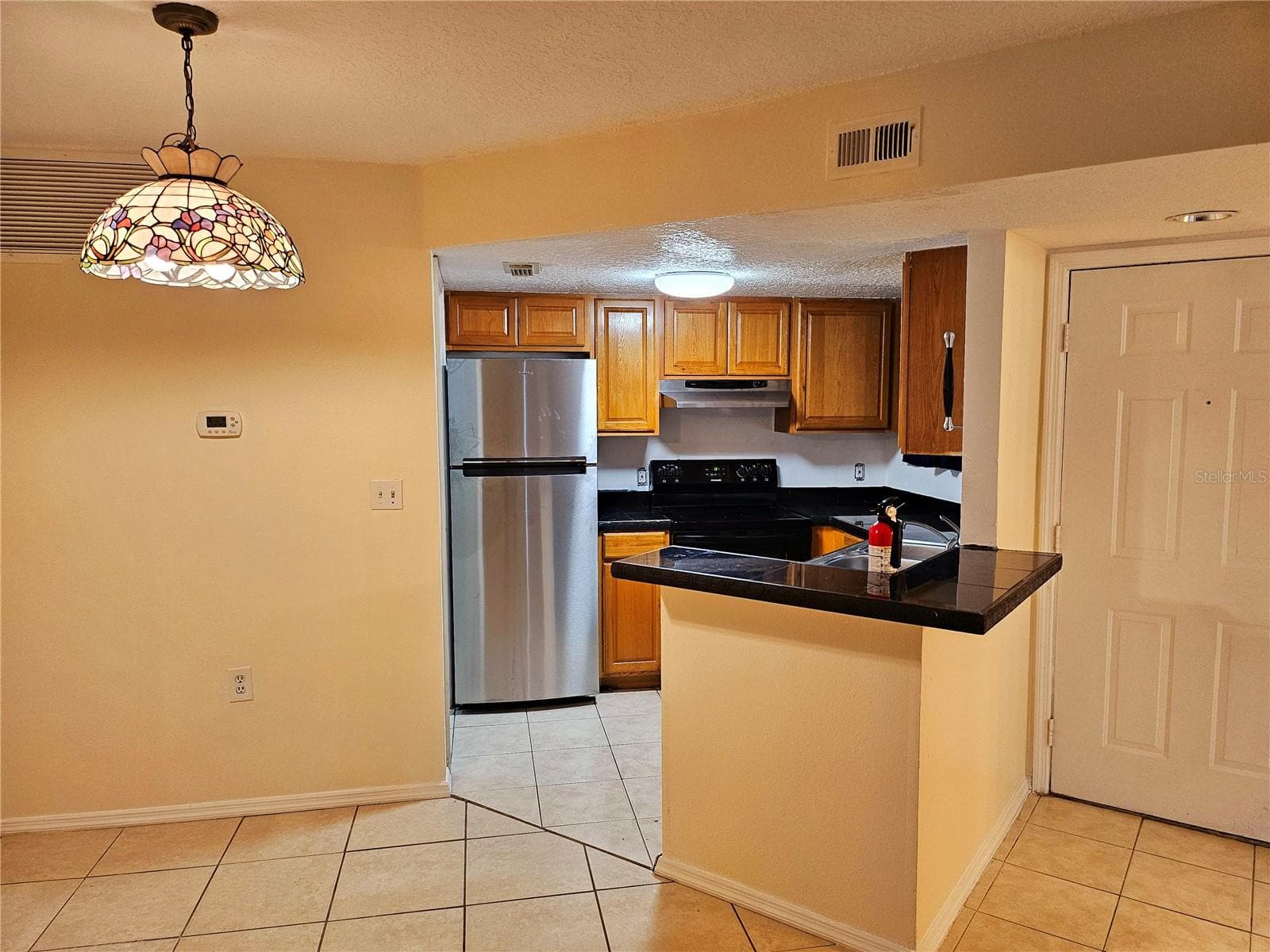 Condominium at 1916 LAKE ATRIUMS CIR #25, ORLANDO, photo 4 of 12