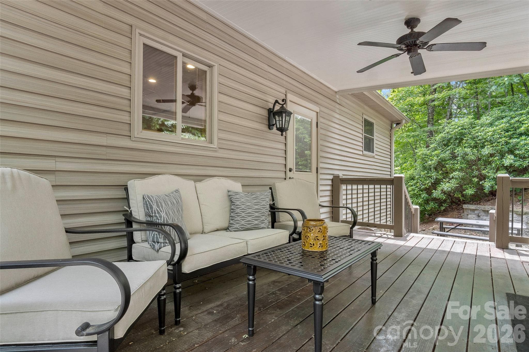 Covered deck off of kitchen. - 179 Rock Spring Road, Lake Lure